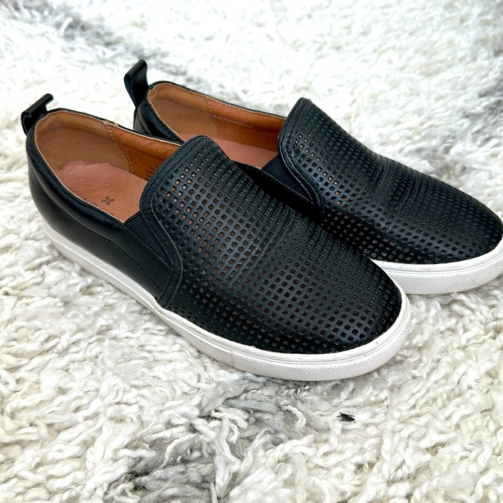 Black leather slip on sneakers